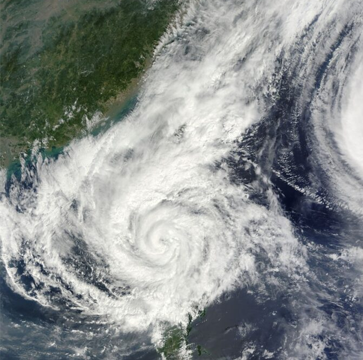 A satellite image of a tropical storm raging along an undefined shoreline