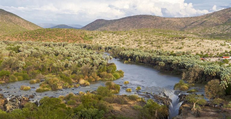 Vast stretches of greenery mark the banks of Kunene River
