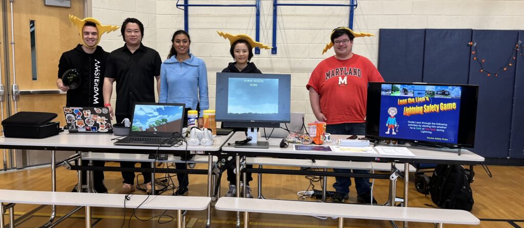 The Lightning Team at the Spooky Science Expo. Left to right: Damian Joseph Figueroa, Guangyang Fang, Ashmita Pyne, Daile Zhang, and Joseph Patton