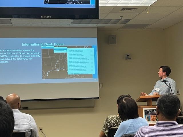 Figure: ESSIC/CISESS Scientist Christopher Smith presenting his research as the Enterprise Proving Ground Satellite Liaison for the NWS Weather Prediction Center (WPC) and Ocean Prediction Center (OPC) to maximize satellite capabilities for weather forecasts.